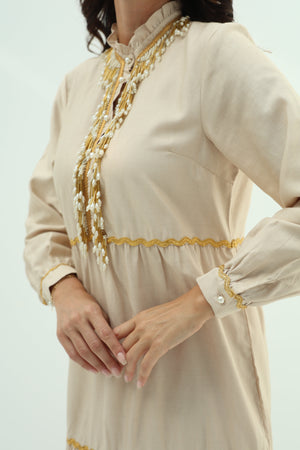 Biege embroidered linen dress design