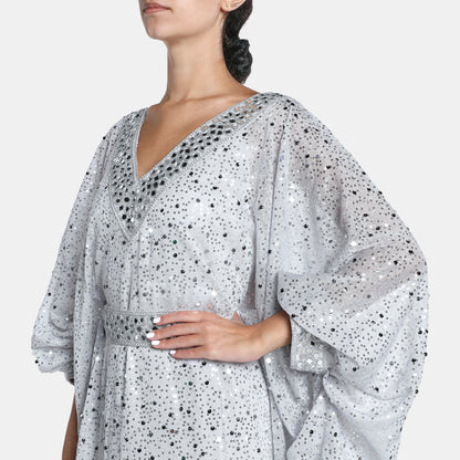 Silver embellished kaftan dress with v-neckline and billowy sleeves