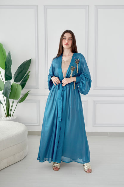 Shiny blue embroidered kaftan with belt