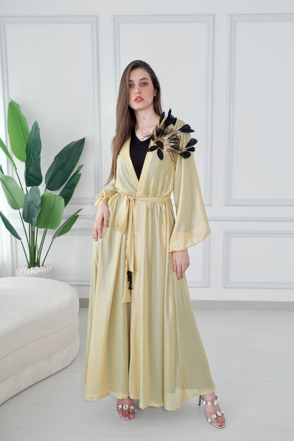 Shiny yellow kaftan with beads embroidery and feathers