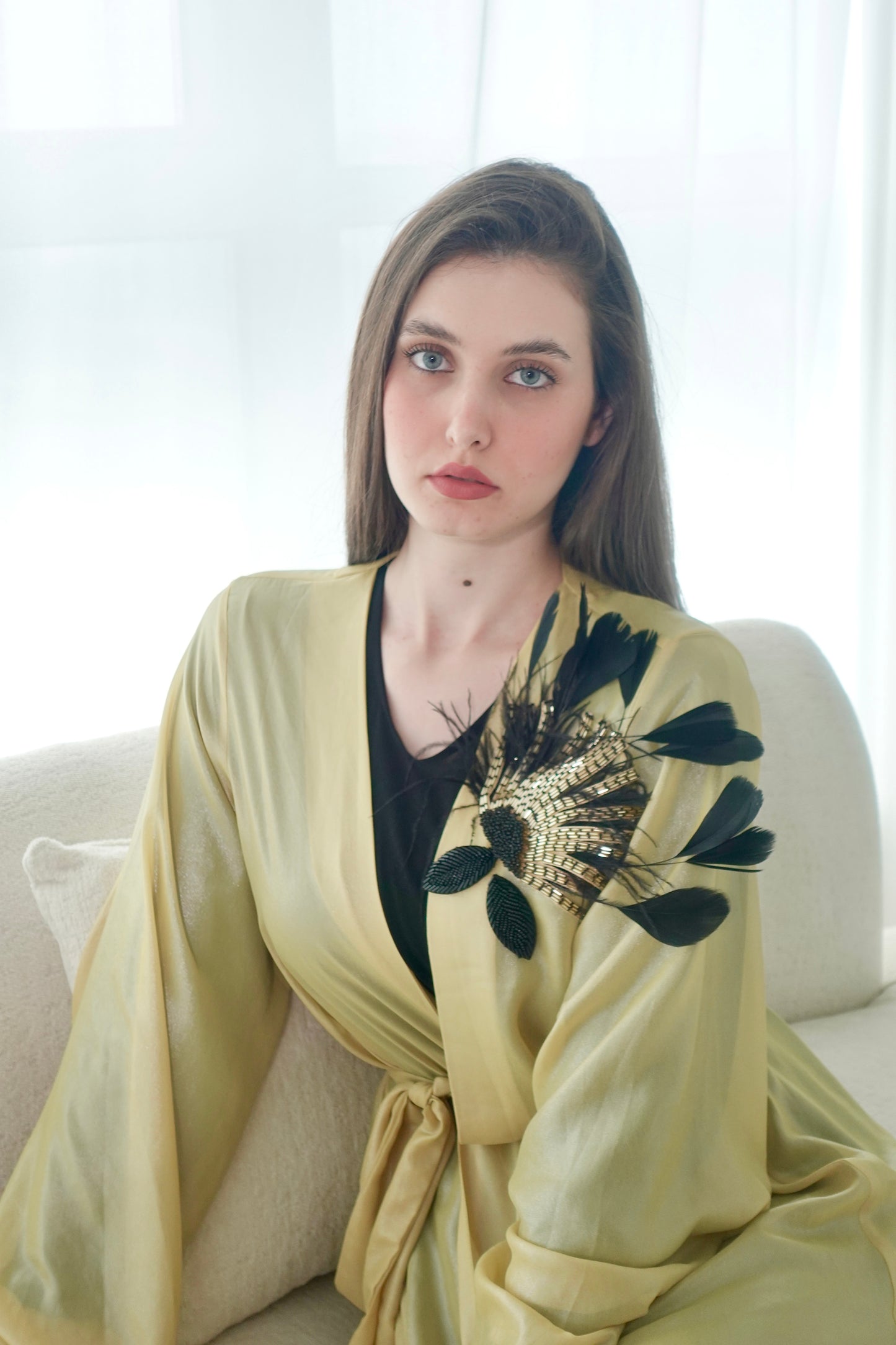 Shiny yellow kaftan with beads embroidery and feathers
