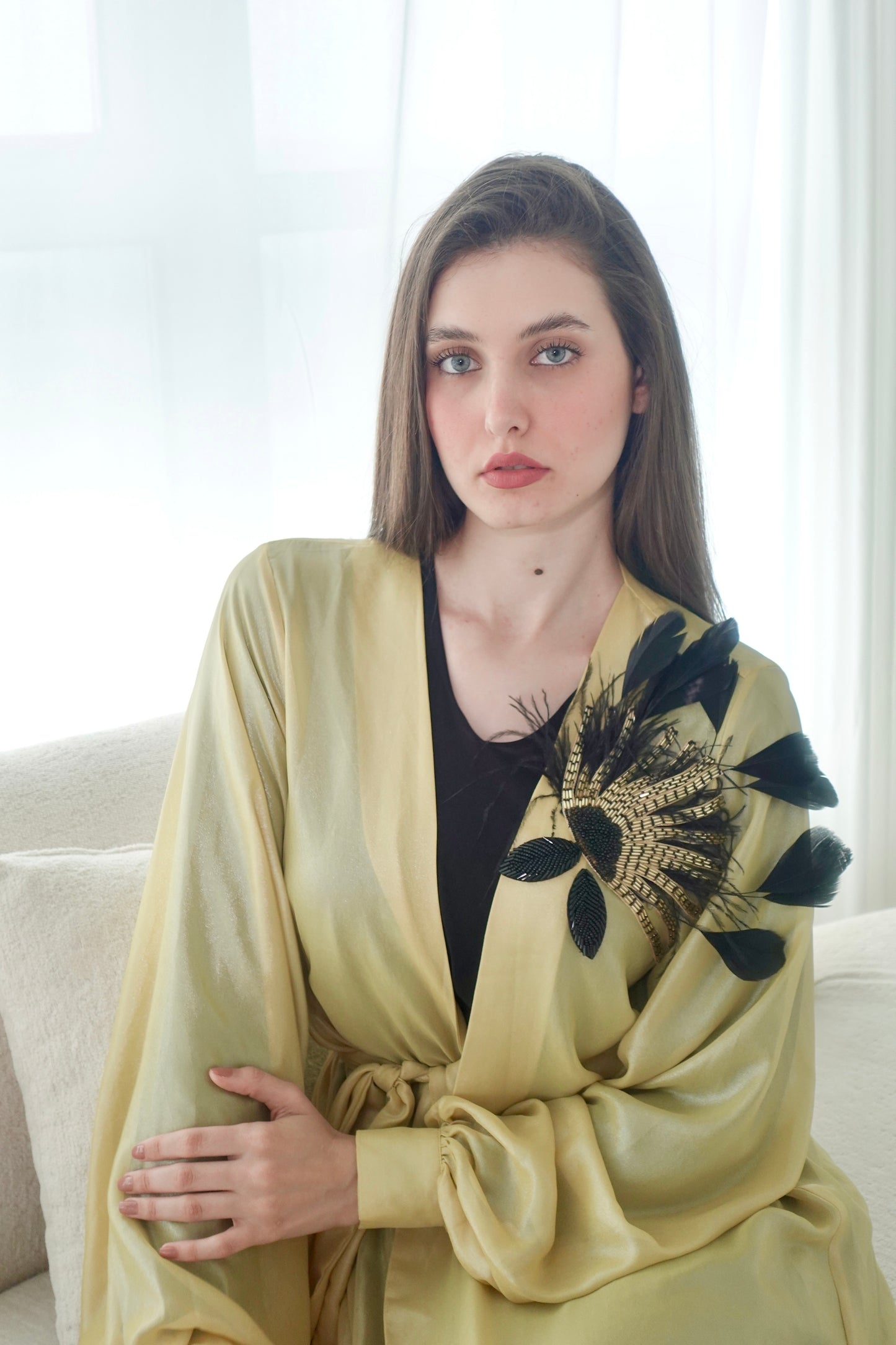 Shiny yellow kaftan with beads embroidery and feathers