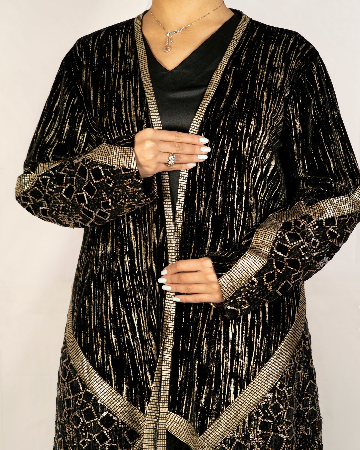 Black velvet abaya designed with multi fabrics and sequence