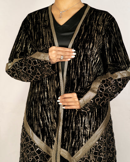 Black velvet abaya designed with multi fabrics and sequence